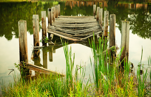 broken pier in a lake, symbolizing bad relationship rules